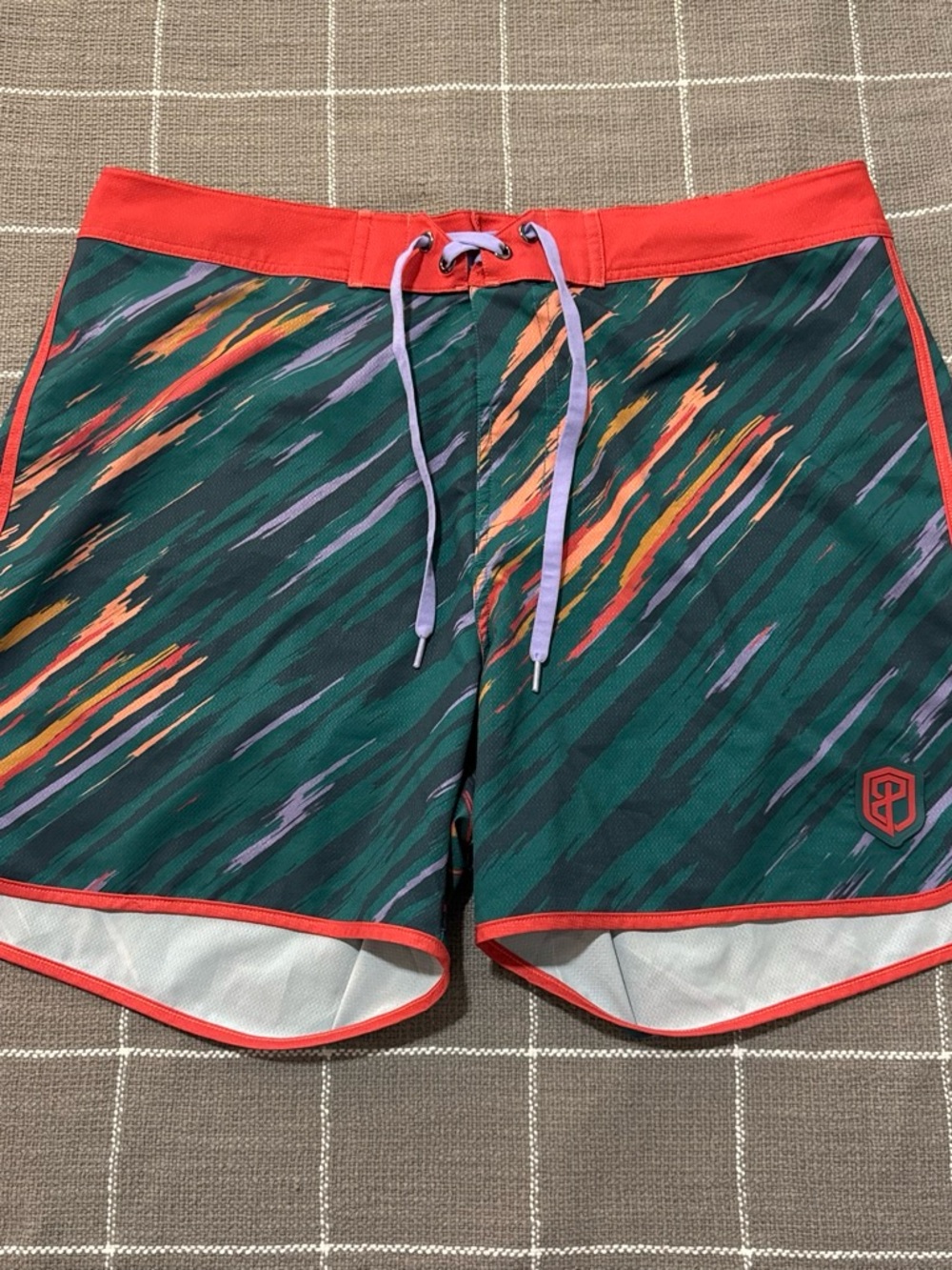 Born Primitive Green Swim Board Shorts with Red Waistband